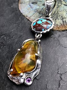 "Artisan Turquoise with Baltic Amber pendant Hand-made Sterling Silver 925 Stones used: Prince Turquoise, Baltic Amber, Amethyst Height - 3 1/4\" (with bail), Width - 1\" Height -85mm (with bail), Width - 26mm Unique Handcrafted One-of a-kind Design Pendant Each Piece of Jewelry in my Collection is Absolutely One of a Kind! When you start wearing a piece of my jewelry you will fall in love with it more and more each day and feel that good Energy and Love that I pass into it while creating this p Soft Solder, Copper Plating, Heirloom Jewelry, Soldering Jewelry, Heirlooms Jewelry, Amber Pendant, Pink Agate, Gift For Woman, Statement Pendant