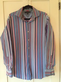 Very nice Tommy Hilfiger button up shirt.  100% cotton.  Blue, white and red stripes.  Long sleeves.  Size large.  Freshly laundered.  Smoke free home, email with any questions.   BN-P Vintage Striped Shirt, Striped Shirts, Bowling Shirts, Outfit Style, White And Red, Button Up Shirt, Up Shirt, Blue Stripes, Button Up Shirts