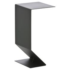 a black metal shelf with an upside down section on it's side, against a white background