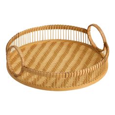 a round wicker tray with two handles