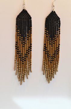 Black Bronze Fringe Earrings, Long Fringe Earrings, Dangle & Drop Earrings, Seed Bead Earrings, Bead Earrings, Lightweight Earrings - Etsy Black Festival Chandelier Earrings With Dangling Beads, Black Beaded Fringe Earrings With Round Beads, Black Beaded Earrings With Round Beads And Fringe, Black Beaded Long Drop Earrings, Black Tassel Earrings With Dangling Beads For Festival, Black Long Drop Earrings With Dangling Beads, Black Beaded Drop Earrings With Gold Beads, Black Fringe Earrings With Round Beads, Black Beaded Fringe Earrings For Party