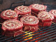 some food is cooking on the grill and being grilled