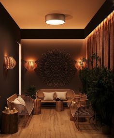 a living room filled with lots of furniture next to a wall mounted planter and potted plants