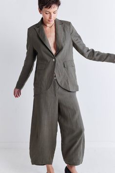 This lightweight and breezy blazer offers a luxurious feel and drapes beautifully on your frame, providing both comfort and style in one stunning package. Pair it with the Carefree Wide Leg Pants for a polished and professional ensemble. Regular sleeve Standard lapel Pockets Regular length Buttons Chic Linen Pantsuit With Notch Lapel, Elegant Linen Pantsuit For Formal Occasions, Elegant Linen Pantsuit For Formal Events, Chic Tailored Linen Pantsuit, Spring Linen Pantsuit With Notch Lapel, Linen Pantsuit With Notch Lapel For Office, Spring Linen Pantsuit For Formal Occasions, Elegant Linen Pantsuit With Pockets, Spring Formal Linen Pantsuit