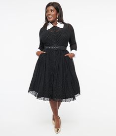 This 1950s vintage-inspired beauty features a delightful black mesh with flocked dots throughout. Crafted from a cozy knit fabric, it's perfect for staying stylishly warm during those cooler days. The dress boasts an elegant layer of tulle that adds volume and movement to every twirl you make. With convenient side pockets and a matching belt included, you'll have both style and functionality at your fingertips. Complete with long sleeves, a contrasting white classic collared neckline, and front button-down detail.Available in sizes XS-5X while supplies last. Goth Pinup, Plus Size Stores, Vintage Plus Size, Bow Shirt, Beauty Features, Bow Shirts, Fashion Mood Board, Cozy Knit, 60s Fashion