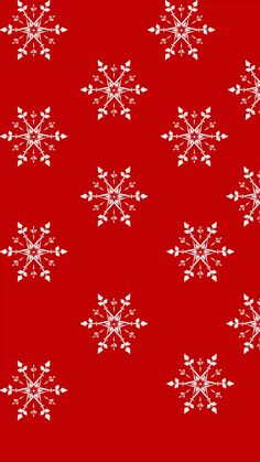 a red background with white snowflakes on it