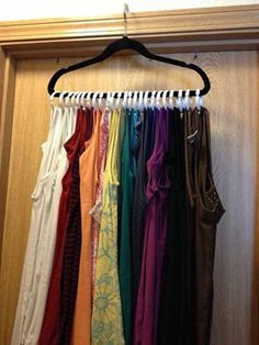 an image of clothes hanging on a rack