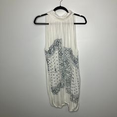 Great Used Condition. No Trades. Smoke Free, Pet Friendly Home. Items Will Be Shipped Appropriately In Polymailer Or Box, Item Could Be Wrinkled In Transit With The Usps. I Will Not Cancel Orders For Any Reason, Except For Error On Sellers End. White Paisley Print Top For Beach, White Bohemian Bandana With Bandana Print, White Casual Bandana With Bandana Print, Casual Sleeveless Bandana Print Tops, Paisley Bandana, Green Paisley, Home Items, Bandana Print, White Green