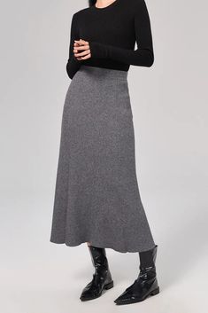 Sophisticated A-line Skirt: Resilient Washable Wool-blend Mastery Our A-line skirt, knit from a blend of washable wool, captures elegance in its purest form. The mid-high waist design elongates the silhouette, while the soft and resilient fabric ensures comfort all day. Style #: WKAI207 Knit Midi Skirt Outfit, Fall Midi Skirt, Warm Skirt, A Line Skirt Outfits, Black Knit Skirt, Knit Skirt Outfit, Long Wool Skirt, Warm Skirts, Midi Skirt Fall