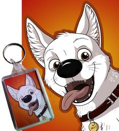 a white dog has its tongue out and is next to a keychain with an image of a cat on it