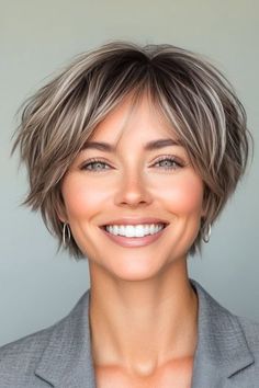 Save this pin for the best short layered haircuts with bangs. Choppy layers with mushroom-shaded highlights create a piecey texture throughout this tousled pixie. Wispy bangs softly part on the forehead for a stylish look. Soft Bangs Short Hair, Bangs Choppy Layers, Bangs Choppy, Tousled Pixie, Mushroom Haircut, Soft Bangs