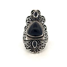 Indulge in the timeless charm of this vintage sterling silver ring, adorned with intricate marcasite detailing and featuring a striking black onyx centerpiece. Crafted with meticulous attention to detail, this exquisite piece exudes sophistication and elegance. The shimmering marcasite stones beautifully complement the deep allure of the black onyx, creating a captivating contrast that catches the eye. With a size 6 fit, this ring is perfect for adding a touch of vintage glamour to any ensemble. Vintage Oxidized Black Jewelry, Antique Black Filigree Rings, Black Vintage Oxidized Jewelry, Classic Black Filigree Rings, Vintage Sterling Silver Ring With Black Enamel, Ornate Black Sterling Silver Rings, Vintage Sterling Silver Rings With Black Enamel, Victorian Black Sterling Silver Rings, Antique Black Jewelry Stamped 925