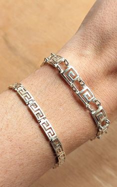 This vintage sterling silver meander link chain bracelet from the 1990s is a dream come true! The  bracelets (I have two available!) are in excellent condition, despite being previously loved, and are in nearly new condition. The chain is sturdy, and made of solid sterling silver - perfect for daily wear.  Layer with other link bracelets, or wear it by itself - either way, it's sure to become your new favorite bracelet! Choose your bracelet from the drop-down menu! Bracelet 1: Length: 7.5 inches Vintage Metal Bracelets With Chain Link, Silver Vintage Chain Link Bracelets, Vintage Silver Chain Link Bracelet, Nickel-free Vintage Metal Bracelet, Nickel-free Metal Vintage Bracelet, Key Bracelet, Greek Key Pattern, Geometric Jewelry, Soft Black