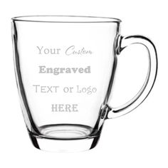 a clear glass mug with the words, your custom engraved on it and an image of a