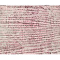 a pink and white area rug with an abstract design on the bottom, in front of a