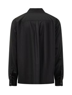 Dolce & Gabbana’s black virgin wool tailored shirt featuring a pointed collar, buttoning at the front and cuffs, buttoned flap chest pockets, logo label on the left pocket and straight hem.Gender: MENMaterial: WOOL OR FINE ANIMAL HAIR->VIRGIN WOOL100 %Color: BlackMade in: ITProduct ID: G5MD1TFU21QN0000*Import tax/duty will be calculated at checkout (If applicable) Fall Dress Shirt With Button Closure For Work, Lapel Collar Dress Shirt With Button Closure For Work, Classic Black Shirt With Welt Pockets, Formal Wool Tops, Lapel Collar Dress Shirt With Button Cuffs For Work, Classic Wool Tops For Workwear, Workwear Dress Shirt With Lapel Collar And Button Cuffs, Black Shirt With Welt Pockets For Work, Black Spread Collar Top With Hidden Button Closure