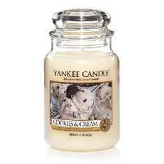 yankee candle with an image of a dog on it's front and the words cookies & cream