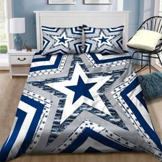 a bed with blue and white stars on it