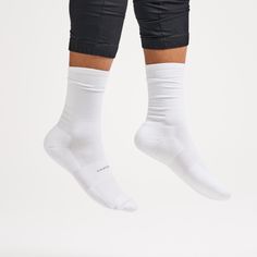 High Performance socks are superior to conventional socks because of their seamless toe, moisture wicking fibers and snug fit. Power bands of Lycra hug your entire foot for maximum support. This snug, supportive fit eliminates movement to prevent blisters. High density cushioning provides extra protection in high impact areas. iWick® fibers wick moisture to keep feet cool and dry, while providing superior durability. Mesh construction on top of the sock provides ventilation for added breathabili Functional Slip-resistant Gym Socks, Sporty Socks With Arch Support And Micro-elastic Fit, Slip-resistant Comfortable Training Socks, Slip-resistant Comfortable Gym Socks, White Stretch Socks With Arch Support, Lightweight No-show Socks For Sports, Sporty Stretch Lightweight Socks, Functional Training Socks With Arch Support, Supportive Stretch Socks With Arch Support