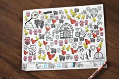 a sheet of paper with farm animals on it next to a crayon marker