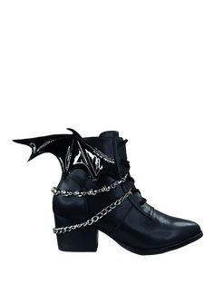 BAT! Inspired by our favorite Vampire Queen from Staten Island. The Nadja is made from a black vegan leather upper and features a Black vegan patent leather bat wing. The lining is made from black cotton canvas with black vegan leather sock. It is adorned with silver chrome chains and has a black rubber outsole. The heel height is 2 inches. Gothic Fitted Boots With Pointed Toe, Black Punk Boots With Pointed Toe, Black Gothic Boots With Pointed Toe, Western Apocalypse, Black Boots With Bat Wings, Bat Boots, Bat Fashion, Bat Corset, Bat Clothing