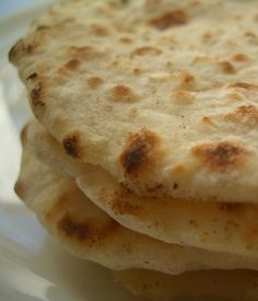 three flat breads stacked on top of each other