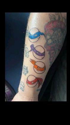 a person with tattoos on their arm and leg, showing the different things they are doing