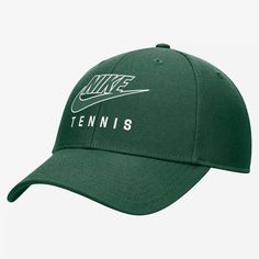 a green nike tennis hat with the word tennis printed on it's front side