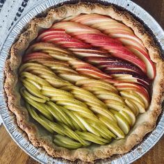 an apple pie with sliced apples in it