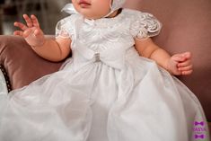 "Made with love and attention to details- this adorable white baptism dress. The lining of dress is 100%-cotton. You may also order accessories to these dresses. Christening shoes, baptism blanket. If you have any doubts, please contact us so we can help you find the best size. The weight and height of a child is not a good way to determine size. We recommend dress sizes based on the chest measurement of the child. The measurements listed below are the actual measurements of the gown, not of you Elegant White First Communion Dress For Ceremony, White Baptism Dress With Lace Bodice For First Communion, White Lace Bodice Gown For Baptism, Elegant White Gown For Confirmation, Elegant White Confirmation Gown, Elegant White Gown For Baptism, White Baptism Dress, Baby Blessing Dress, Lace Baby Bonnet