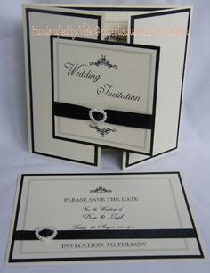 wedding card with black and white trimmings on the front, side and back