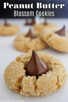 peanut butter blossom cookies with chocolate on top