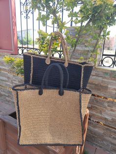 Any woman must have this bag for every fashionista.Whether you keeping it to yourself or gifting someone you care, it will be unforgettable. I made this beautiful bag from straw and black natural paper rope which is organic cotton. Suitable for use as shoulder bag, beach bag or party bag You can combine your clothes with a straw summer bag on summer days This bag has a packable form and does not take up space in the suitcase. Unique for holidays ! There is a large mesh pocket inside the bag. Han Large Capacity Rectangular Straw Bag For Shopping, Black Handheld Bag For Vacation, Black Handheld Bags For Vacation, Black Handheld Vacation Bags, Black Straw Shoulder Beach Bag, Black Large Capacity Bucket Bag For Beach Season, Black Summer Bucket Bag For Shopping, Black Bucket Bag With Large Capacity For Vacation, Black Straw Shoulder Bag With Large Capacity