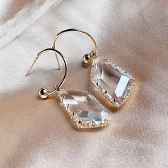 Karly Glass Gem Earrings feature crystal clear glass crystals dangling on a C hoop. About 1.5 in. long Gem Earrings, Glass Gems, Hypoallergenic Jewelry, Jewelry Manufacturers, Crystal Glass, Crystal Clear, Amazing Jewelry, Beautiful Earrings, Clear Glass