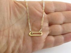 Fabulous 14k Yellow Gold Paperclip Carabiner Chain Necklace Material: 14k gold, Not plated or filled Legth: 18" long  Width: 2 mm wide links Carabiner Size: 3/4" long by 1/4" wide Weight: 4.2 grams  Clasp: Carabier Bottom part opnes and snaps close Gift Box included  Images may be enlarged to show detail and the item may look larger than it appears in person.In order to reduce buyer remorse and return please pay attention to the photos and read description to make sure about measurements such as Minimalist Gold Necklace With Hooks And Links, Gold Paperclip Necklace With Hooks And Links, Fine Jewellery Necklace, Paper Clip, New Yorker, Twinkle Twinkle, Pay Attention, Favorite Jewelry, Charm Necklace