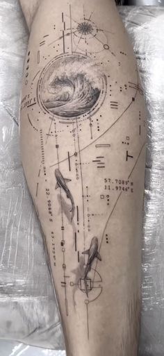 a man's thigh with some drawings on it