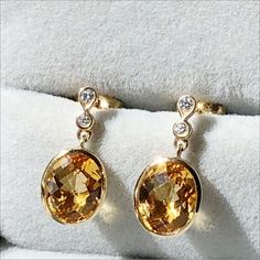 14k 14kt Yellow Gold Earrings With Two Small Diamonds On The Ear And A Pineapple Cut Citrine Hanging Below. These Earrings Are So Gorgeous. They Glow When Worn And Catch The Light Beautifully. Weight: 2.8 Grams Stamped And Acid Tested Condition: Pre Owned. Excellent Used Condition Item # 127 Luxury Citrine Classic Earrings, Elegant Citrine Faceted Earrings, Luxury Yellow Citrine Earrings, Elegant Yellow Diamond-cut Earrings, Classic Yellow Citrine Earrings, Citrine Earrings, Yellow Gold Earring, Citrine, Gold Diamond