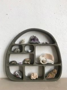 a shelf that has some rocks in it