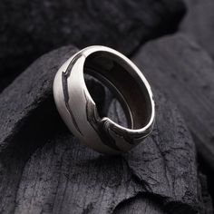 Delicate and strong at the same this ring was inspired by the Scandinavian rocky mountains and its stone texture highlights the resilience and the strength of character. We ship with FedEx courier Like this Product? Take a look at these:  ☼ Men's black slate silver signet ring  https://www.etsy.com/listing/573134617/black-slate-mens-signet-ring-sterling  ☼ Men`s unique design wide silver ring https://www.etsy.com/listing/559081540/black-slate-mens-wide-ring-sterling  If you are like us charmed b Minimalist Untreated Open Ring, Brutalist Hand-forged Open Ring Jewelry, Nature-inspired Untreated Rings For Promise, Untreated Nature-inspired Promise Ring, Adjustable Brutalist Jewelry Gift, Brutalist Style Metal Open Ring, Brutalist Style Open Metal Ring, Nature-inspired Polished Ring Jewelry, Nature-inspired Polished Jewelry Ring