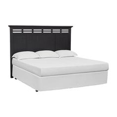 a bed with white sheets and black headboard on it's side, against a white background