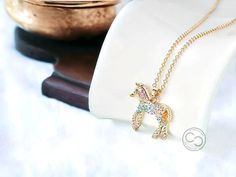 "Unleash your equestrian spirit with our exquisite Horse Pendant Necklace, a timeless piece that captures the grace and beauty of these majestic creatures. Crafted with meticulous attention to detail, this necklace is a tribute to the bond between horse and rider. Available in both silver and gold finishes, our pendant necklace adds a touch of elegance to any outfit. Whether you're a seasoned equestrian or simply admire the beauty of horses, this necklace is sure to become a cherished addition to your jewelry collection. Each pendant features a stunning horse design, delicately sculpted to showcase the intricate details of mane, tail, and musculature. The pendant hangs gracefully from a dainty chain, creating a subtle yet striking statement piece. Treat yourself or surprise a horse lover i Equine Jewelry, Equestrian Necklace, Majestic Creatures, Horse Pendant, Equestrian Jewelry, Horse And Rider, Gold Horse, Horse Silhouette, Lovers Necklace