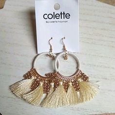 Brand New On Retail Hang Card By Colette. These Gold Tone Hoop Dangles Far Exceed The Ordinary Tassel Earrings To Create Great Looks. Hoops Are Wrapped In White Fabric Cording. Bottoms Are Adorned With Multiple Hanging Gold Beads. Three Off White Tassels Complete The Look. All In All These Dangle 3-1/4" And Are 1-3/8" At The Widest. Dangle From Gold Tone Ear Wires. * Must Bundle 3 To Get The 3 For $15 Offer * White Tassel, Bedroom Lighting, White Fabric, Tassel Earrings, White Fabrics, Gold Beads, Ear Wires, The 3, The Ordinary