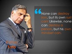 a man in a suit and tie holding his hand to his head with a quote on it