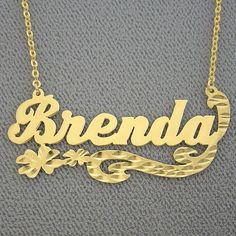 "*Average Name Pendant Width : 1 3/4 Inch (4.5 cm) Approx. *Up to 9 Letters. *Pendant Thickness : 0.5 mm / 25 Gauge / 0.020\" *Premium high end quality personalized laser cut out any letters/numbers in 10kt or 14kt solid yellow or white gold personalized name necklace, this item comes with split sturdy 1.25 mm Flat Rollo chain from 15~20 inches, name pendant length not included on length option. *This pendant cut out by latest technology laser machine, top quality guaranteed. *All personalized j Classic Gold Jewelry In Flower Shape, Elegant Name Necklace With Flower Pendant, Gold Name Necklace With Flower Shape, Gold Flower-shaped Name Necklace, Gold Flower Necklace With Name, Gold Flower Jewelry With Intricate Design, Personalized Flower Shape Gold Jewelry, Ornate 14k Stamped Necklaces For Anniversary, Gold Engraved Flower-shaped Necklace