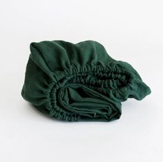 folded green cloth on white background