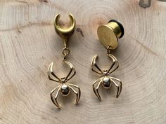 "6g (4mm) - 1 3/16 (30mm) 18k Plated \"Radiant Gold Weaver\" Earrings Saddles Hiders Drop Dangle Earrings Gauges/Earplugs Plugs. 🕷️✨ Add a touch of playful mystique to your style with our \"Radiant Gold Weaver\" earrings. Plated in stunning 18K gold, these earrings feature a whimsical spider design that adds a dash of intrigue to your stretched lobes. Let your ears shimmer with the allure of these unique accessories, perfect for those who appreciate the enchanting beauty of spiders. PLEASE read section regarding sizing before purchasing as due to sensitive nature of my products (body jewelry) as I cannot accept returns of exchanges.  HIDERS:  The plugs themselves are stainless steel w/black silicone 'o' ring and disc is gold plated copper.  The plug in this photo is 12mm and the disc is 1 Gold Internally Threaded Drop Earrings, Handmade Gold Dangle Body Jewelry, Gold Handmade Dangle Body Jewelry, Adjustable Gothic Gold Jewelry, Gothic Gold Body Jewelry Gift, Gold Internally Threaded Plug Earrings, Nickel-free Gold Gothic Jewelry, Gothic Gold Nickel-free Jewelry, Adjustable Gold Pierced Body Jewelry