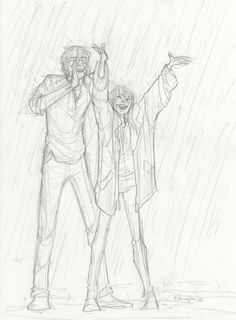 two people standing in the rain with their arms up