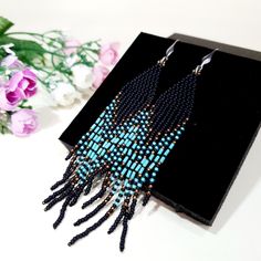 Blue Turquoise ,Matt Black and bronze color combination.Long tassel earrings. Beaded earrings. native American style .Fringe earrings .Seed Bead Earrings .Boho earrings . Materials;Sterling silver ear wire. High quality japanese beads 3 shades. This bead does not lose its color and does not darken. Earrings length 4.5 inches (11cm) You can see a large selection of earrings on my page https://www.etsy.com/il-en/shop/JewelryByElenaZar?ref=seller-platform-mcnav§ion_id=25458740 Bohemian Black Tassel Earrings With Round Beads, Black Bohemian Tassel Earrings With Round Beads, Bohemian Tassel Earrings With Black Beads For Gift, Bohemian Black Beaded Tassel Earrings Gift, Bohemian Black Tassel Earrings As Gift, Black Tassel Drop Earrings With Colorful Beads, Black Tassel Earrings With Colorful Beads For Gift, Black Bohemian Jewelry With Tassels, Black Bohemian Long Drop Earrings