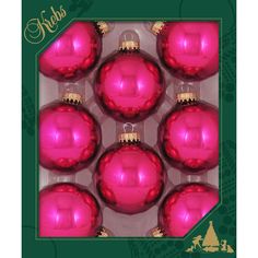 six pink christmas ornaments in a box