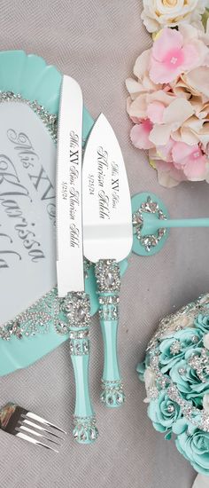 the wedding cake knife and server set is decorated with swaroons